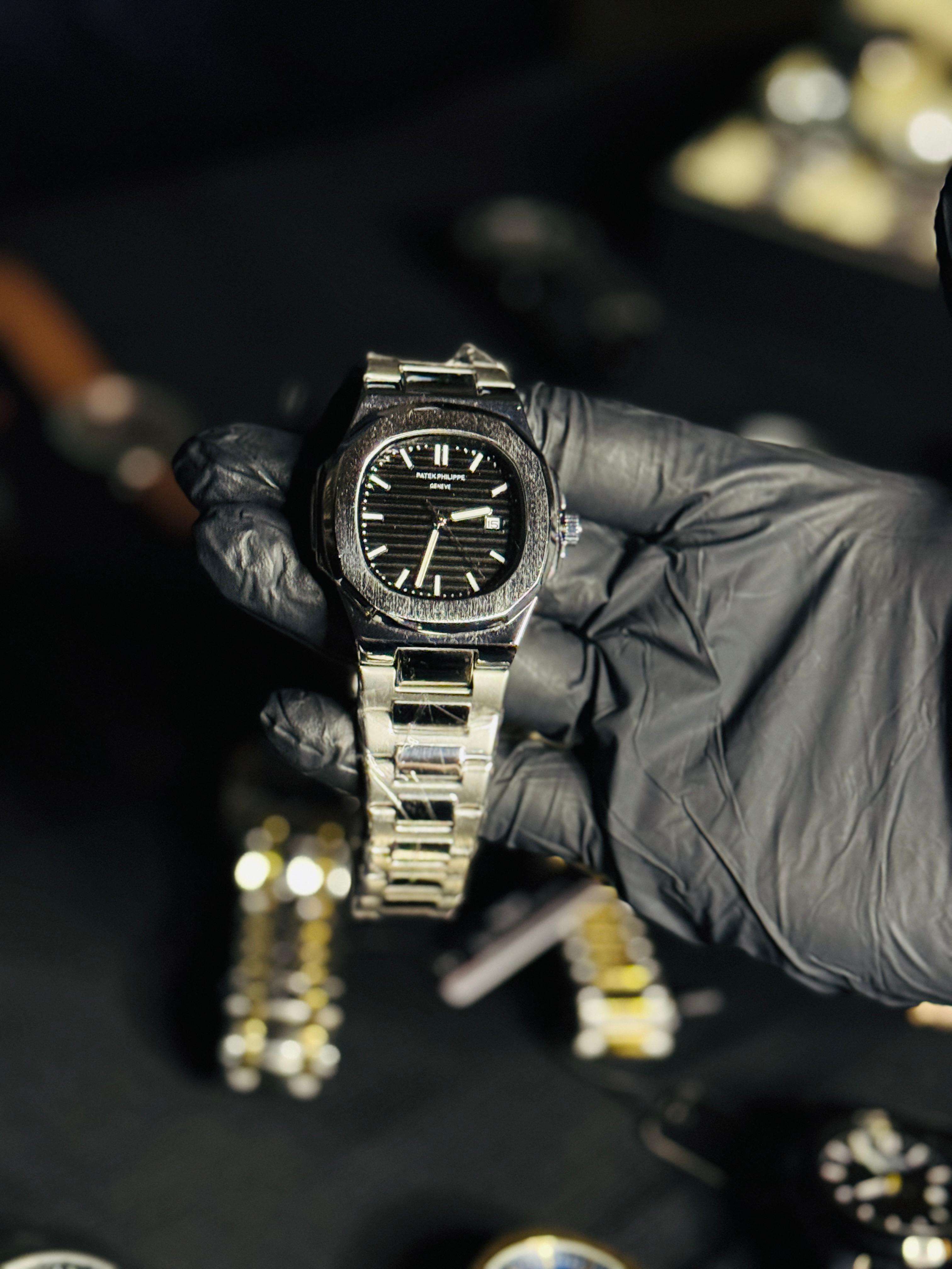 PATEK PHILIPPE BLACK DIAL WITH SILVER CHAIN