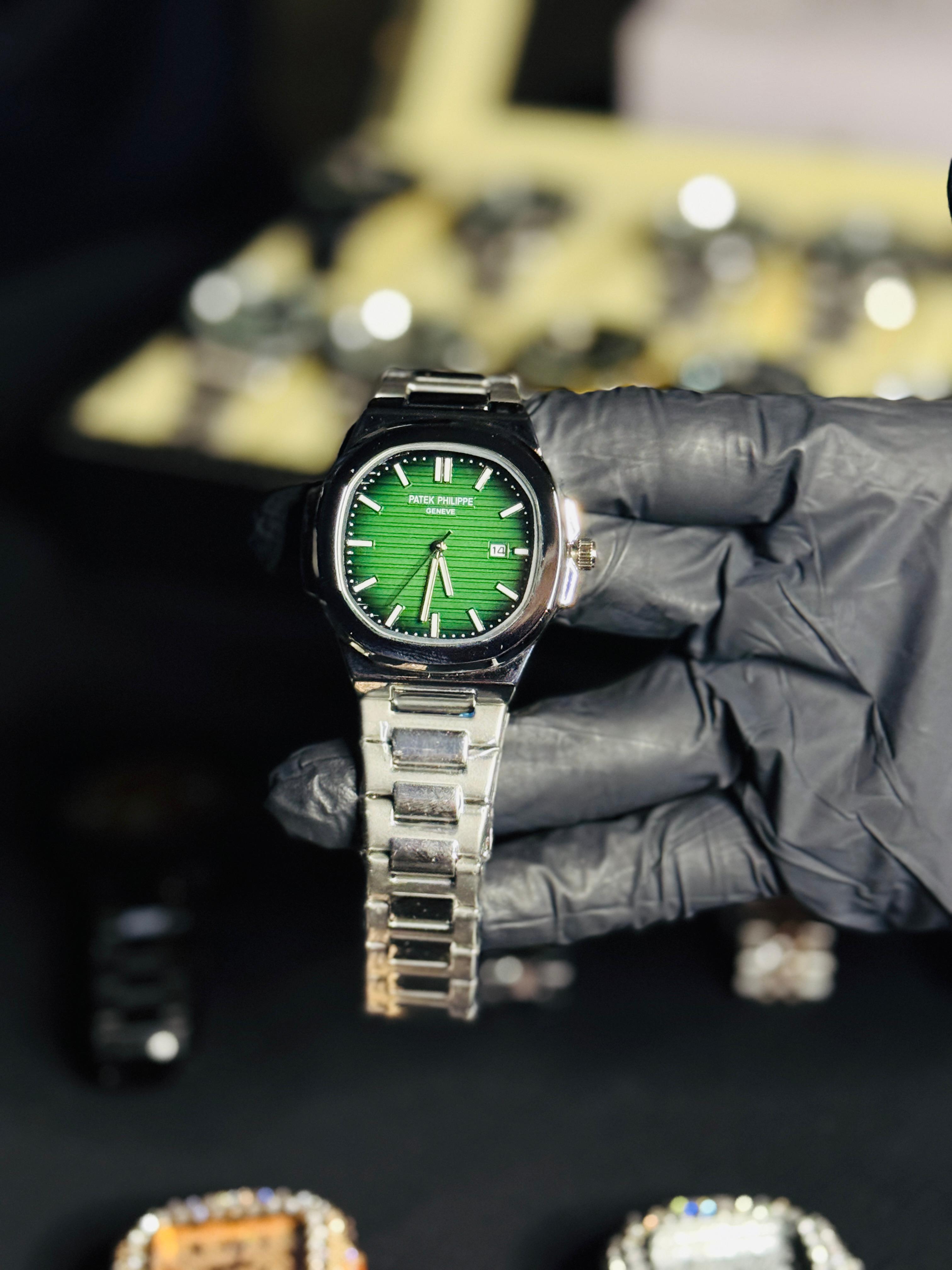 PATEK PHILIPPE GREEN DIAL WITH SILVER CHAIN