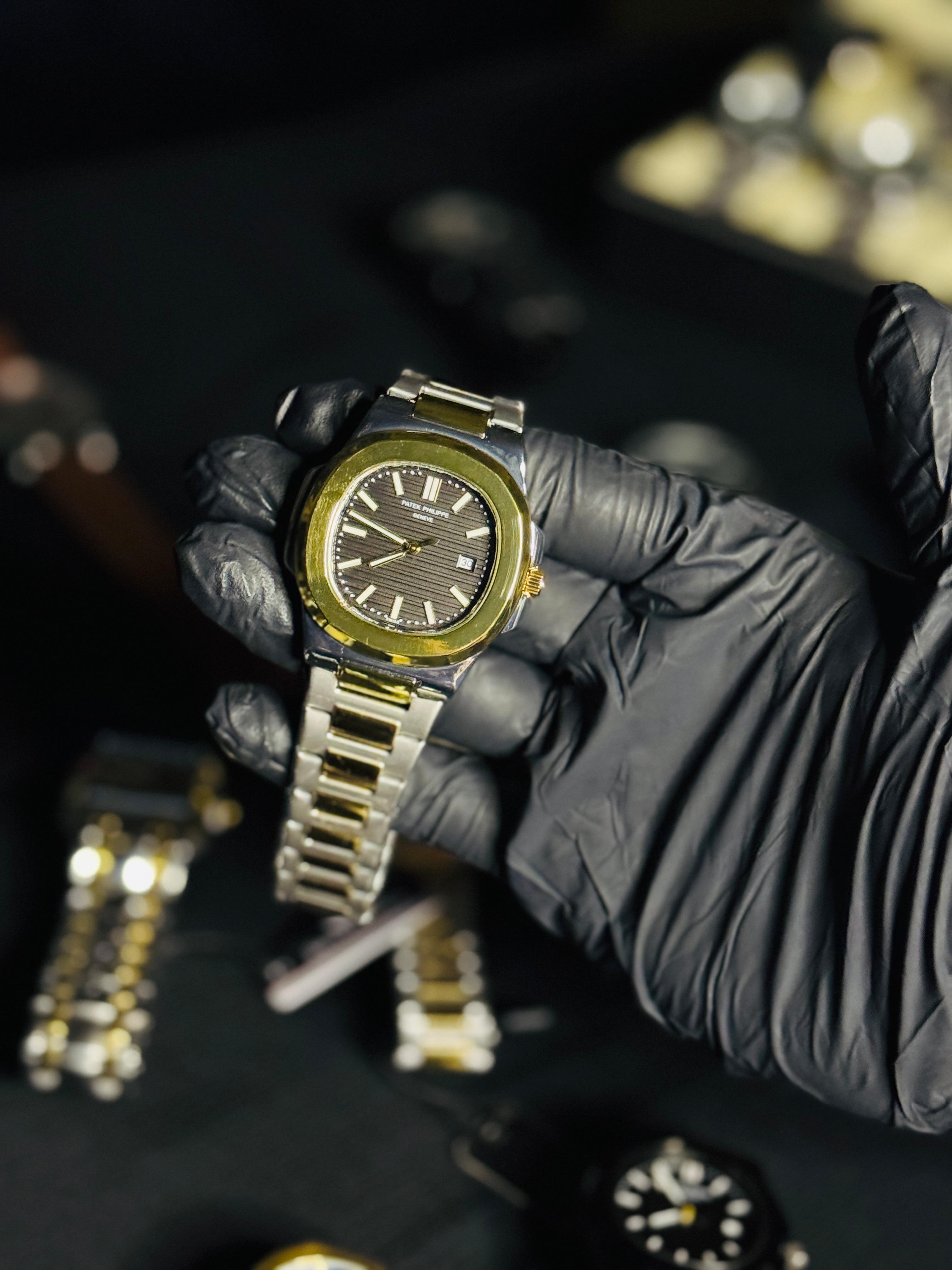 PATEK PHILIPPE BLACK DIAL WITH SILVER AND GOLDEN CHAIN