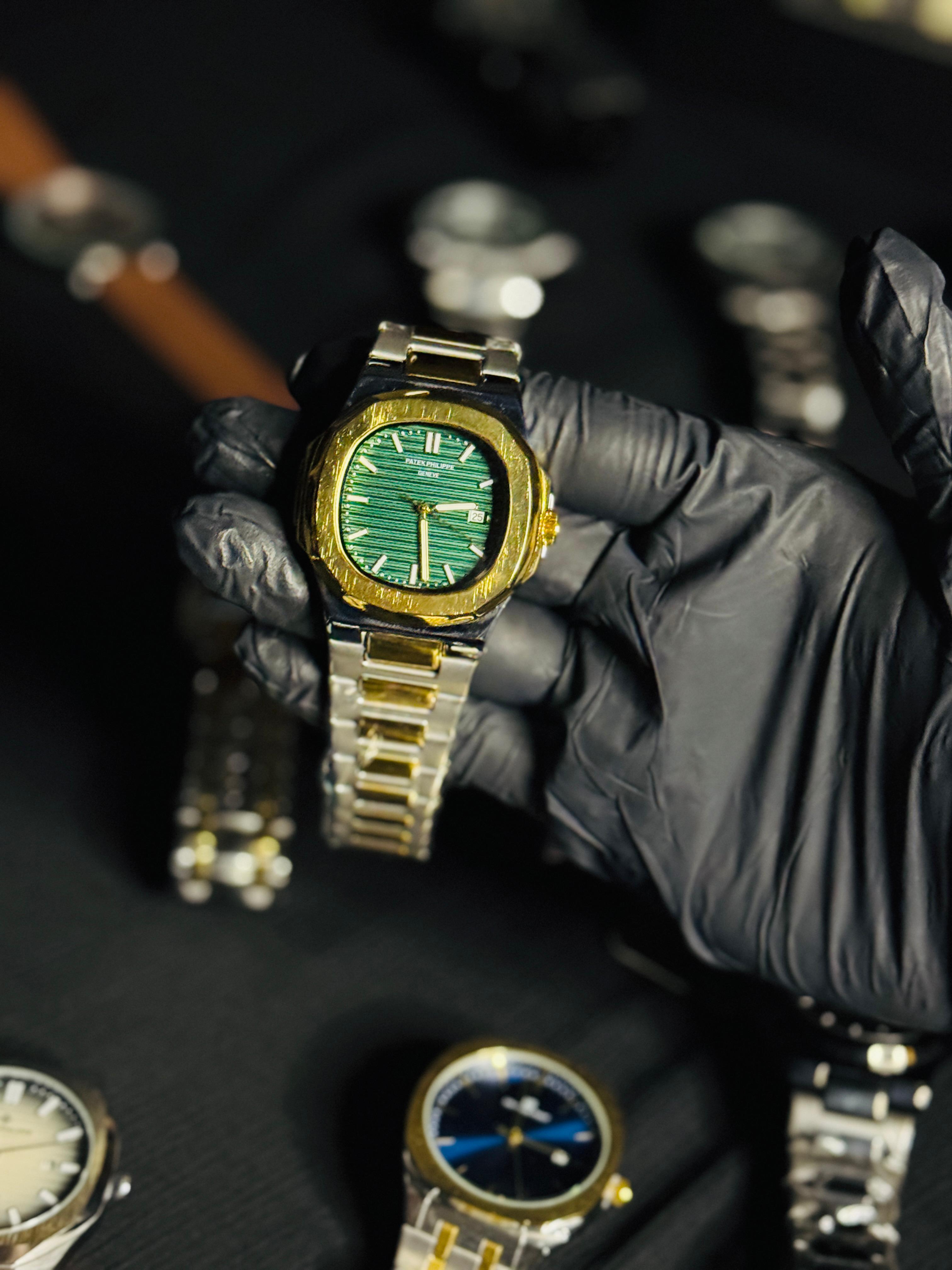PATEK PHILIPPE GREEN DIAL WITH SILVER AND GOLDEN CHAIN